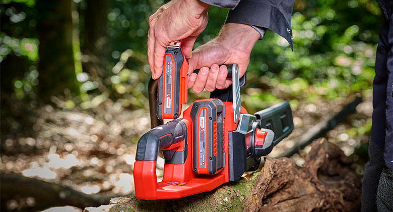 some one puts two Einhell Power X-Change batteries in a cordless saw