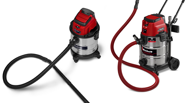 Two Einhell wet-dry vacuum cleaners with different suction hoses – a standard suction hose and a robust premium suction hose.