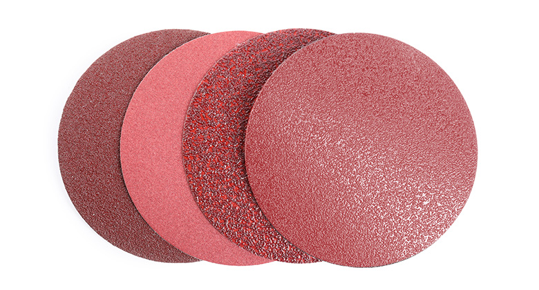 Four sanding discs in various grits.