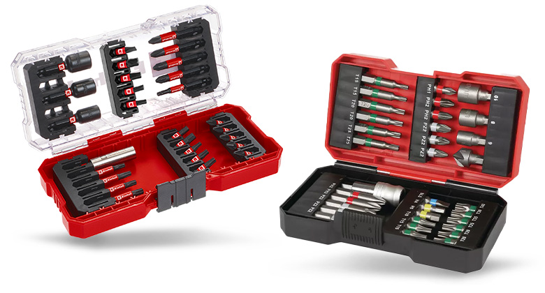 Two open toolboxes display extensive sets of screwdriver bits and attachments.