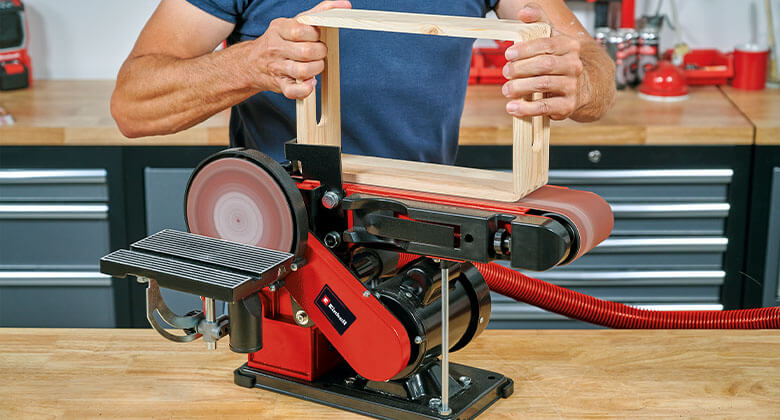 stationary belt-disc sander in use