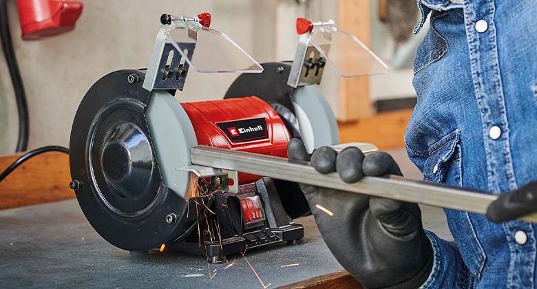bench grinder in use
