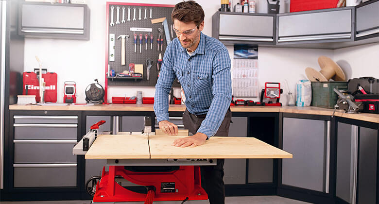 man showing precision of a table saw